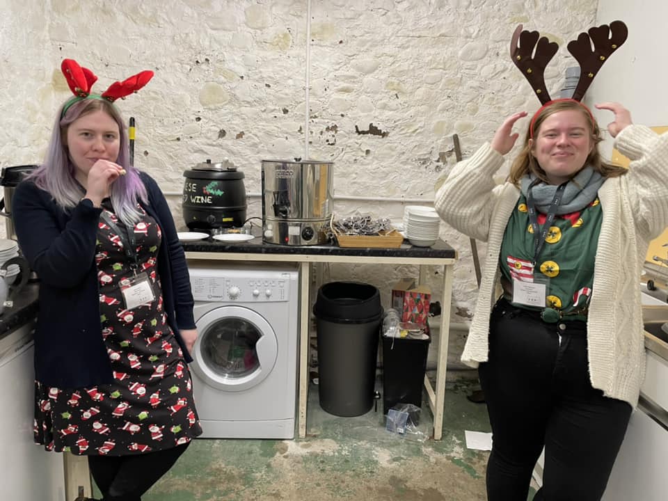 Sarah and Caitlin showing their festive outfits.