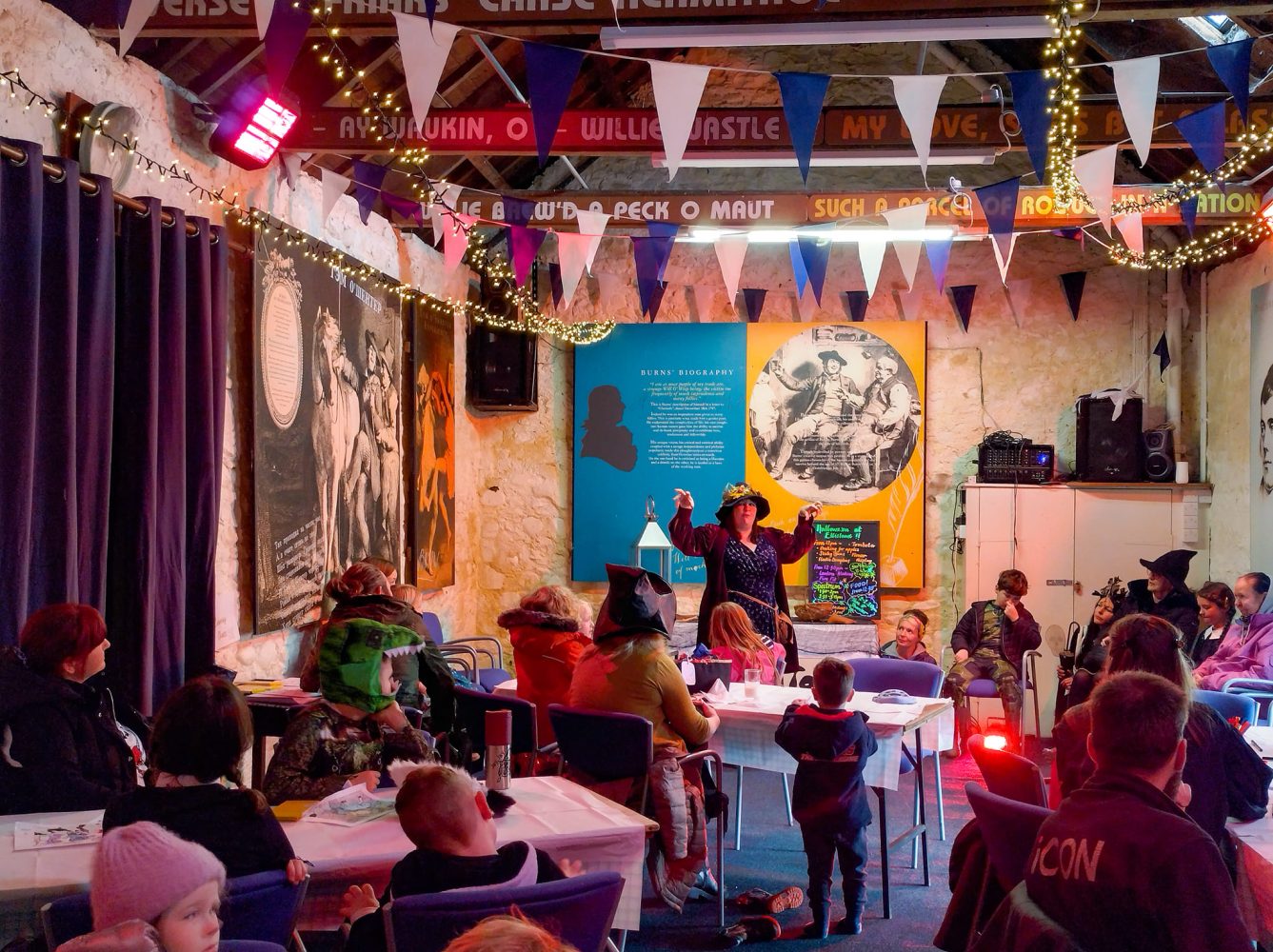 Susi Briggs doing storytelling at Halloween for an event